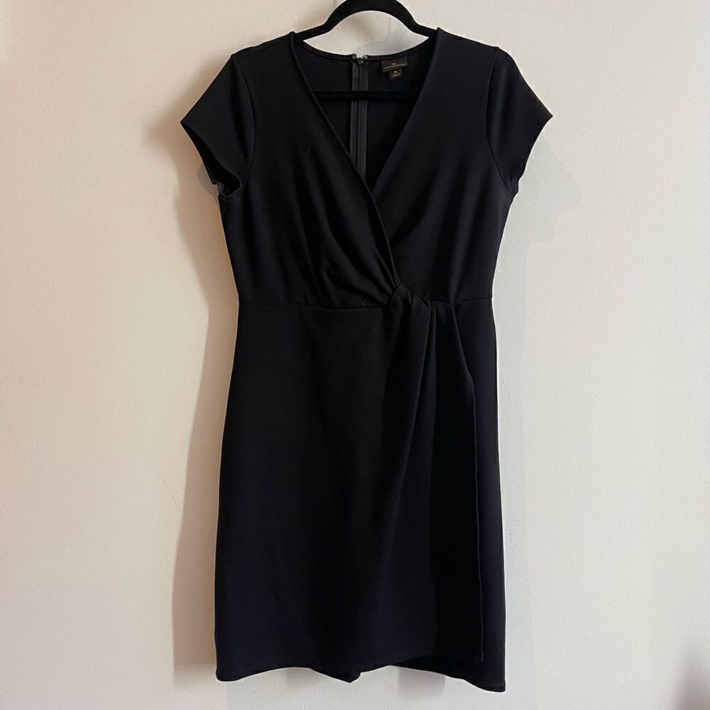Worthington Faux Wrap Style Little Black Dress - 8

Length 36
Pit to Pit 18
Shou